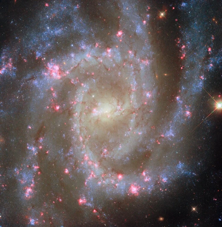 ESA Reveals Stunning Image of Eye of the Serpent Galaxy