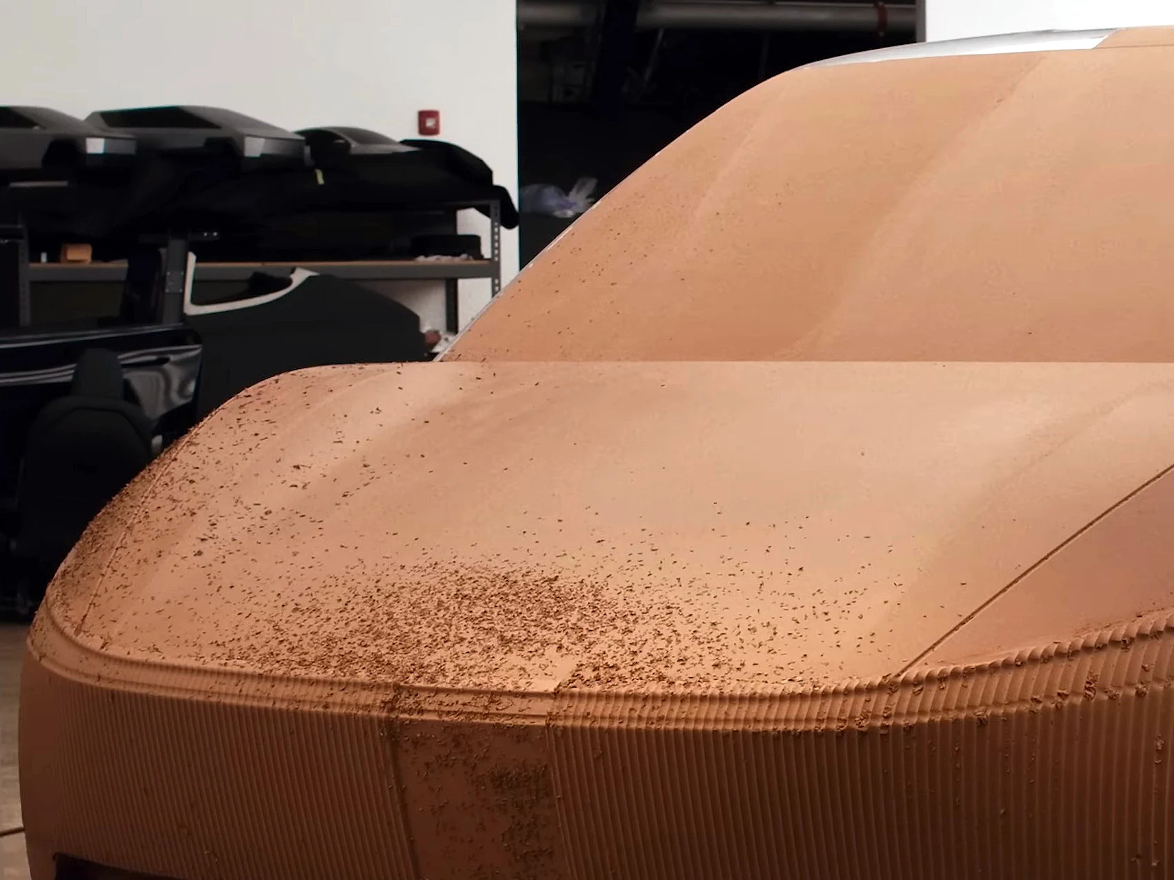 Tesla’s Mysterious 3-Row SUV: Cybertruck-Inspired Design
