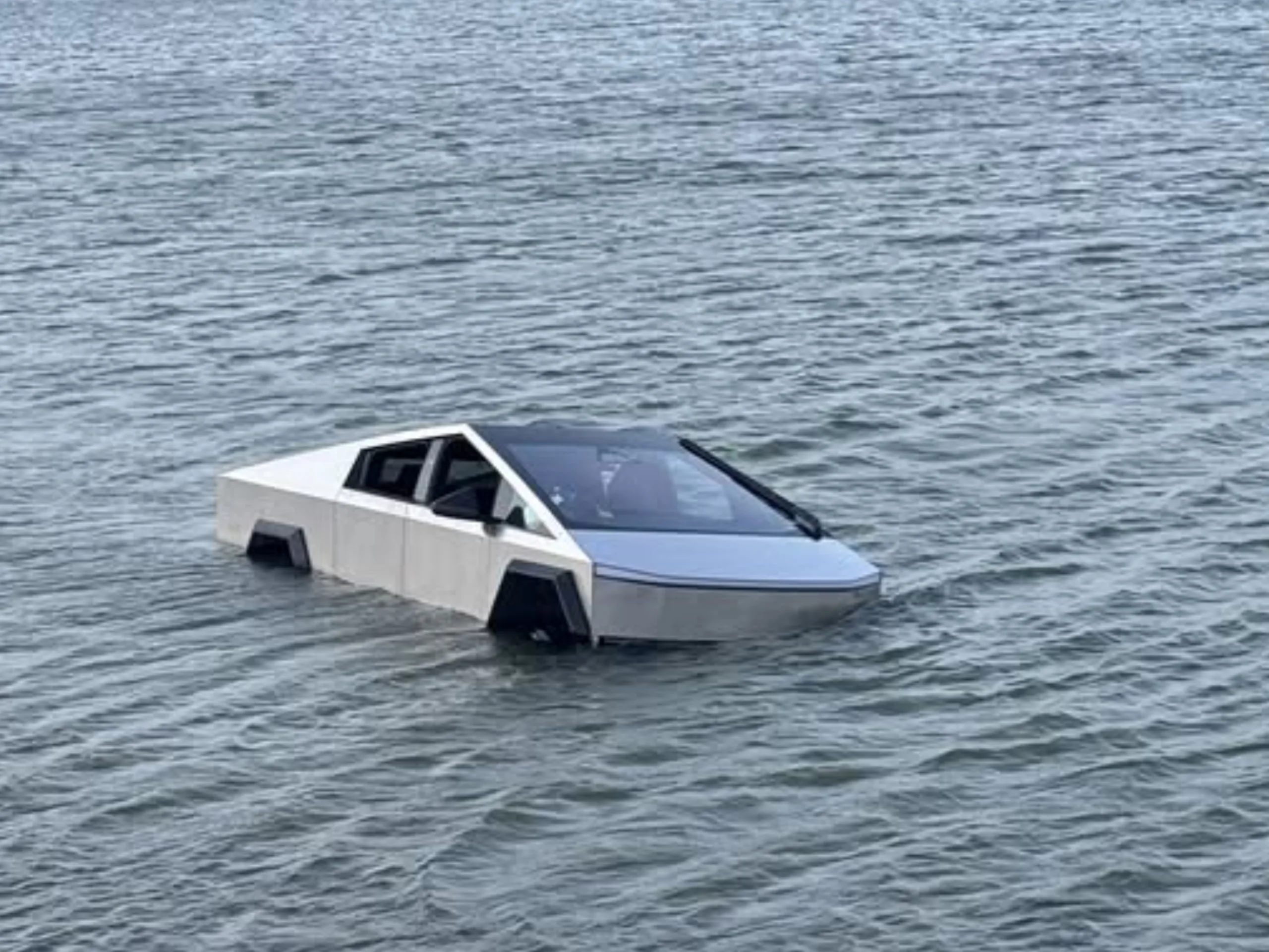 Tesla Cybertruck Wade Mode test after sinking; vehicle recovered from lake
